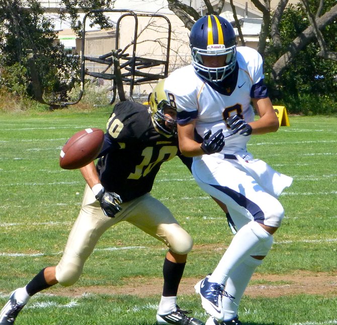 Webb junior receiver Kienan Dixon loses the ball with Army-Navy sophomore defensive back Cameron Coe providing tight coverage