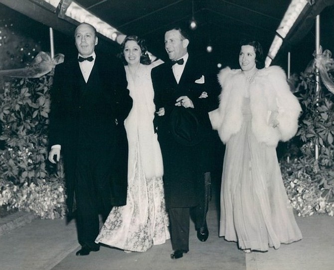 Jack Benny, Mary Livingston. George Burns, and Gracie Allen walk the red carpet. January 7, 1937.